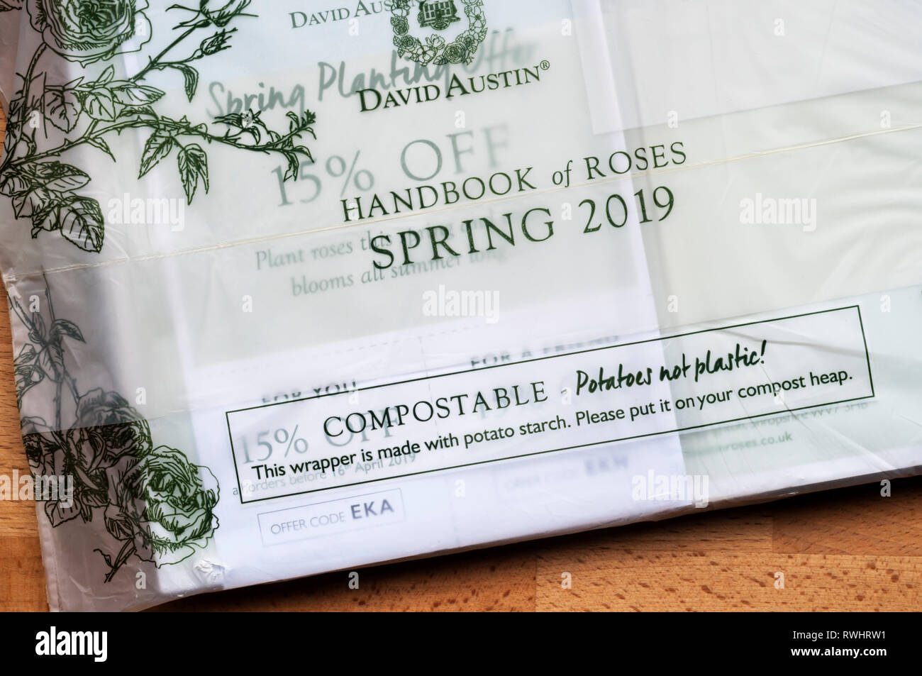Compostable bag for David Austin roses catalogue.  Made from biodegradable potato starch to reduce plastic pollution. Stock Photo