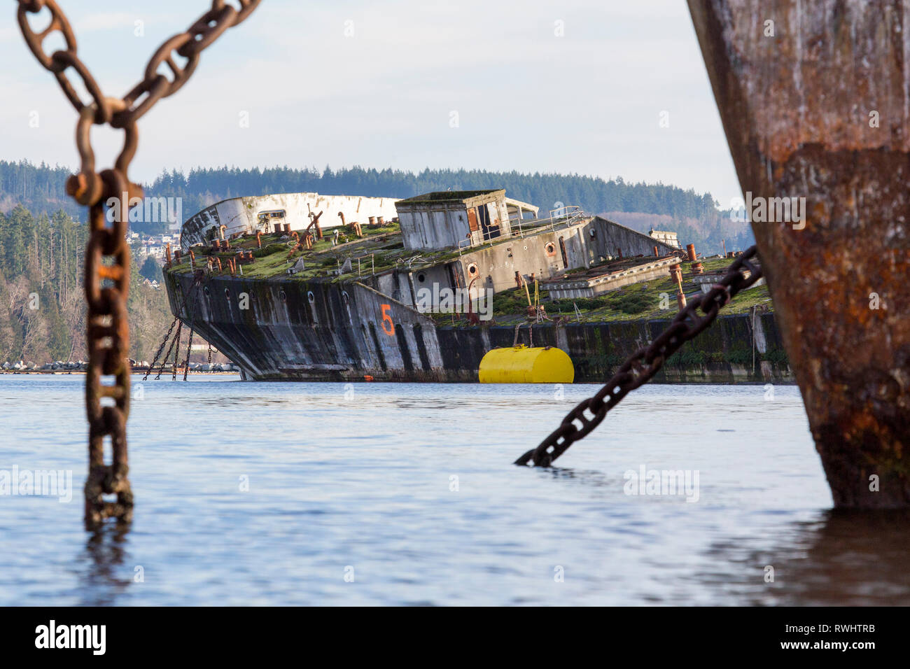 A concrete barge, used as a breakwater for Catalyst Paper's Mill in Powell River, British Columbia, Canada Stock Photo
