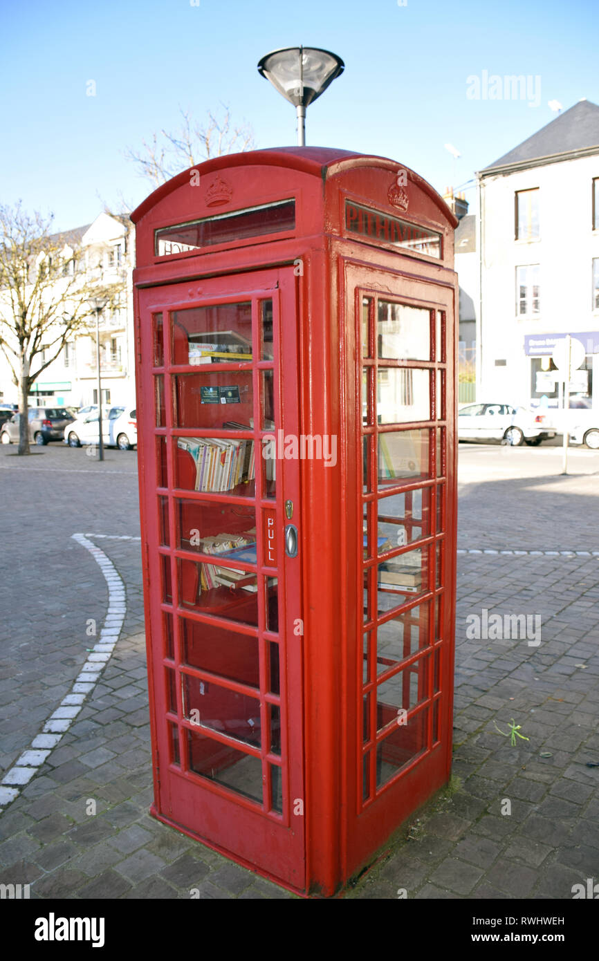 Pithiviers in France is twinned with Ashby-de-la-Zouch in England. Donated red telephone box converted into a book swap library. Feb 2019 Stock Photo