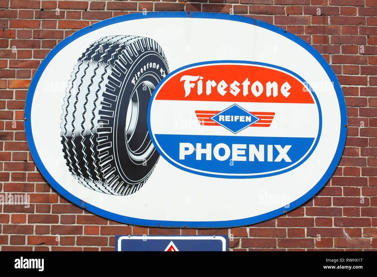 old sign Firestone, Tire, Phoenix on a gas station, Bruchhausen-Vilsen, Lower Saxony, Germany, Europe I altes Schild Firestone, Reifen, Phoenix auf ei Stock Photo