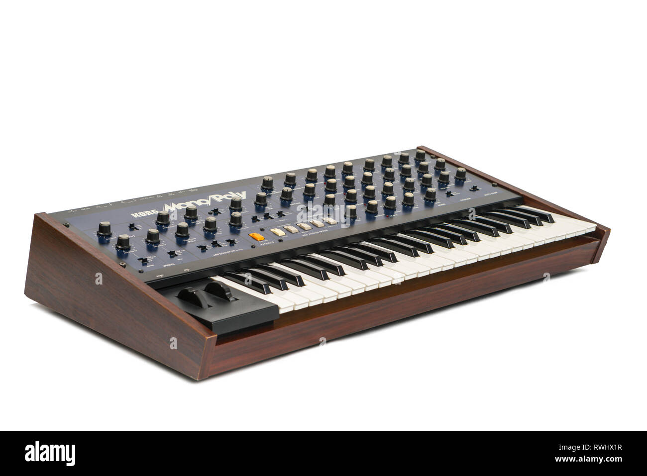 Korg Monopoly vintage analog synthesizer from 1981 and white studio background. Stock Photo