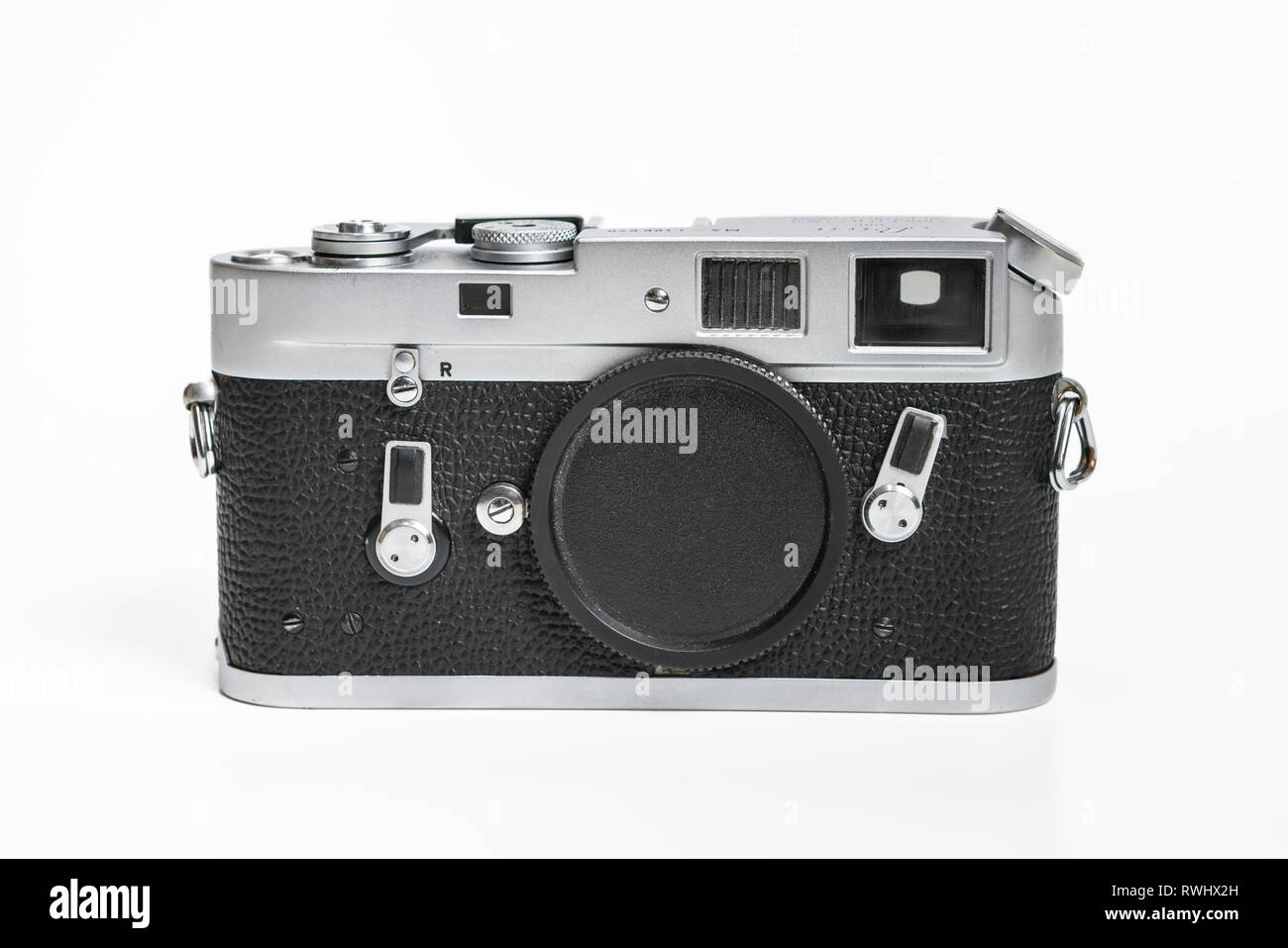 Leitz Leica M4 from 1967, vintage analog film camera. Body only with no lens on white studio background. Stock Photo