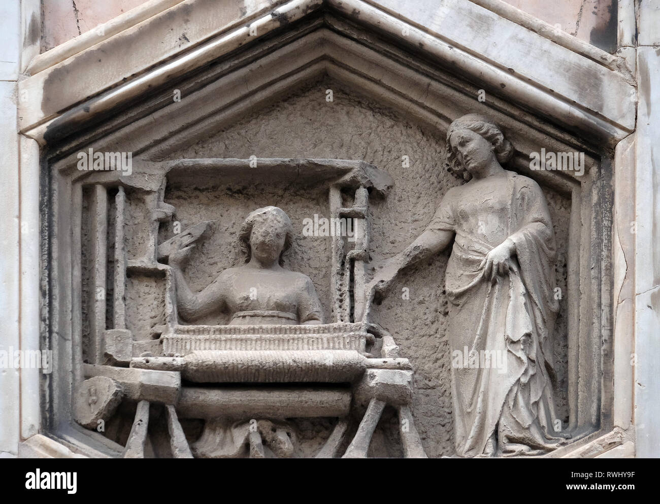 The Art of Weaving from the workshop of Andrea Pisano, Relief on Giotto Campanile of Cattedrale di Santa Maria del Fiore in Florence Stock Photo