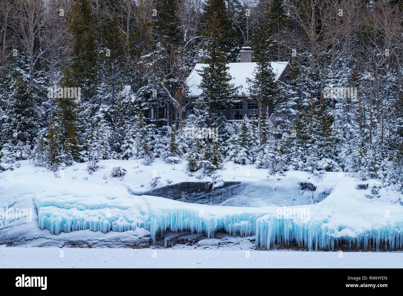 Cottage And Icicles At Shoreline Of Georgian Bay Tobermory