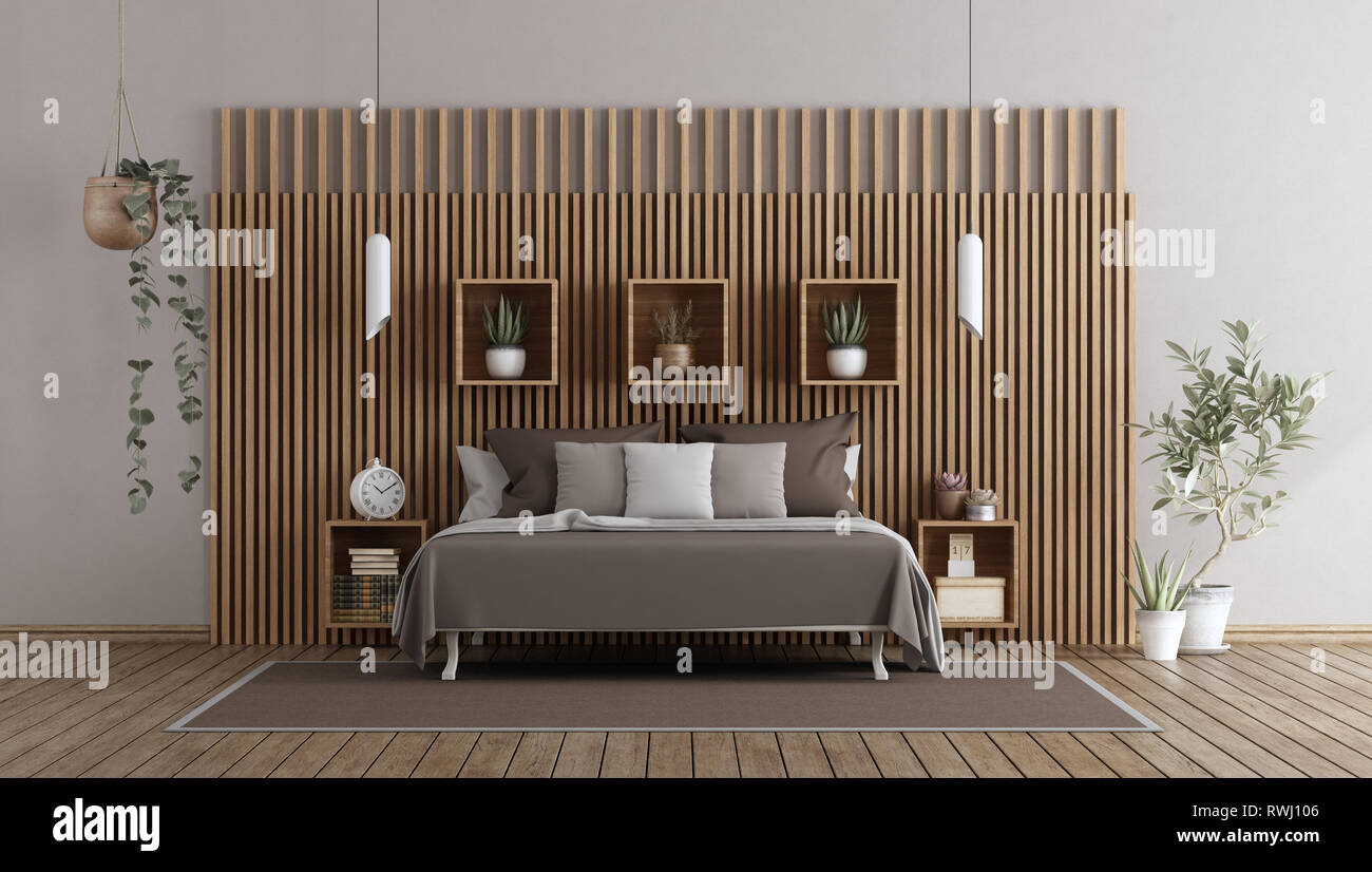 Modern bedroom with double bed against wooden paneling - 3d rendering Stock Photo
