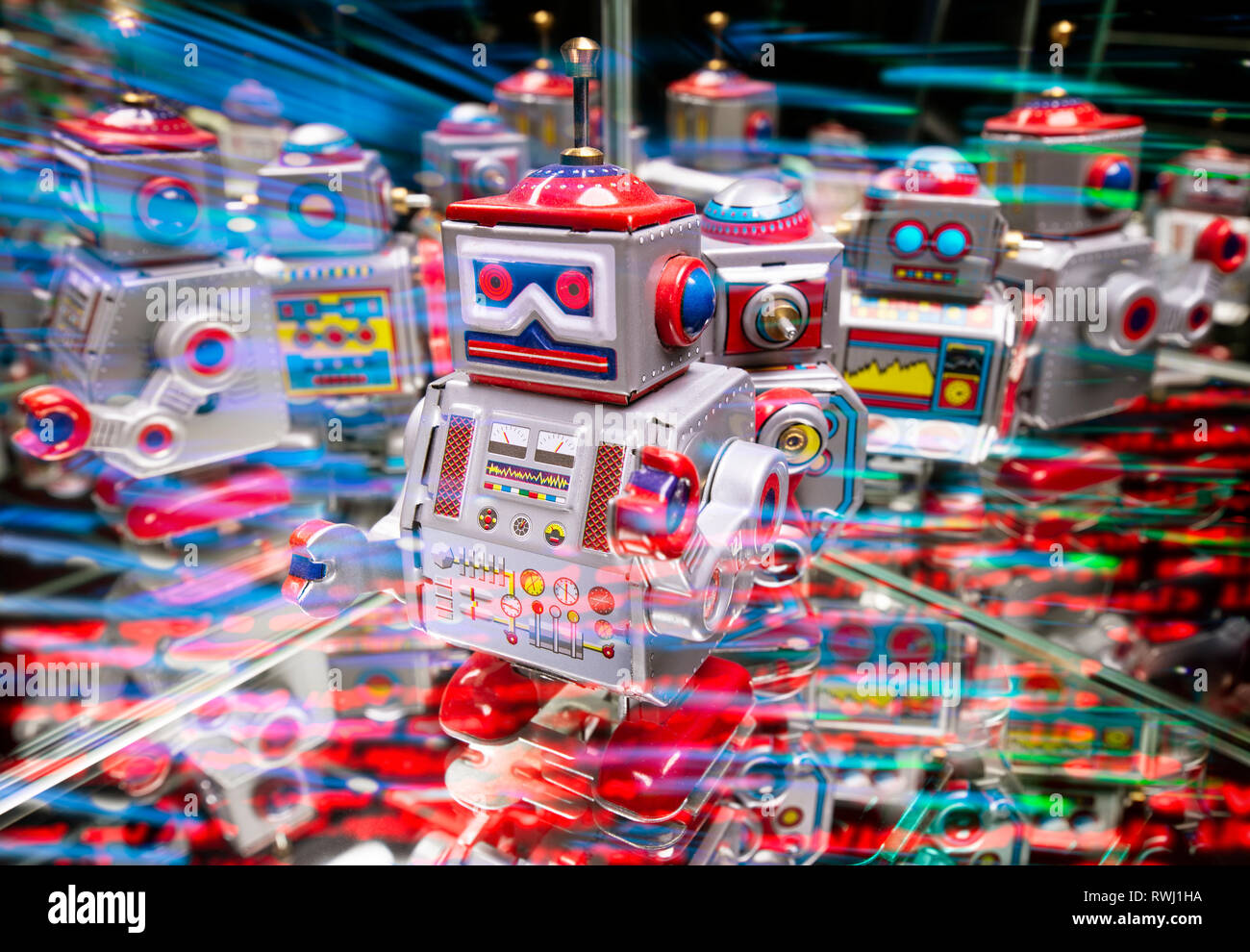 Robots with reflections and various colored lights Stock Photo