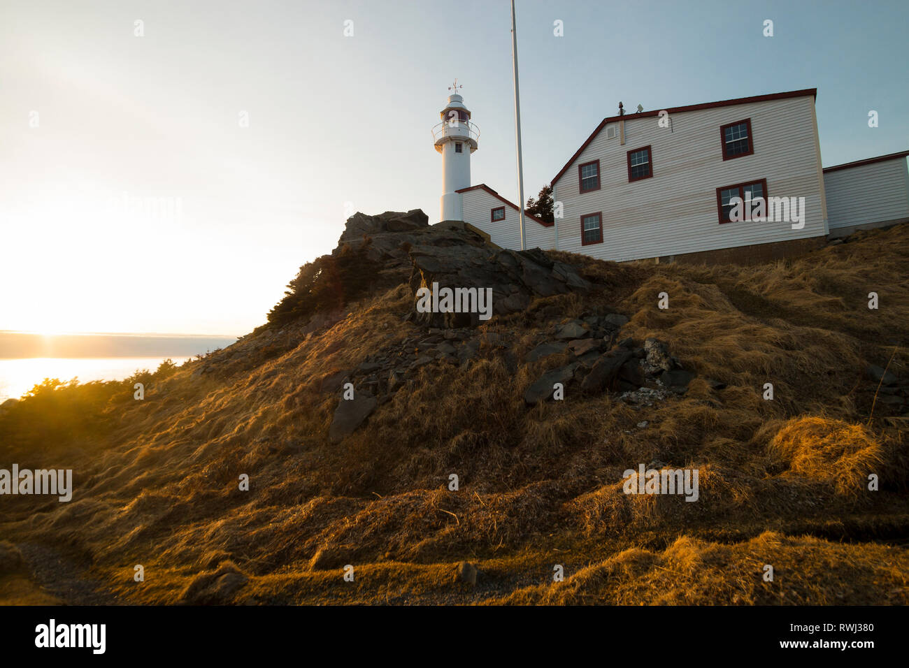 sunset, Lobster Cove Head Lighthouse, Rocky Harbour, Gros Morne National Park, Newfoundland and Labrador Stock Photo