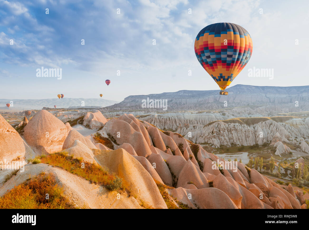 great tourist attraction of Cappadocia balloon flight. Cappadocia is one of the best places to fly with hot air balloons. Goreme, Cappadocia, Turkey. Stock Photo