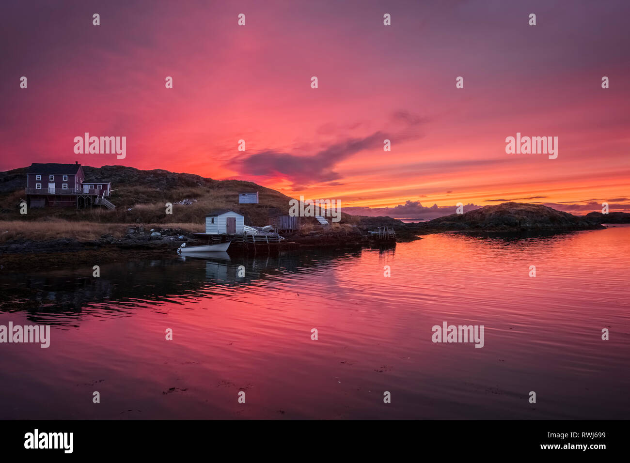 on looking sunset on the shores of Change Islands during low tide, Newfoundland and Labrador Stock Photo