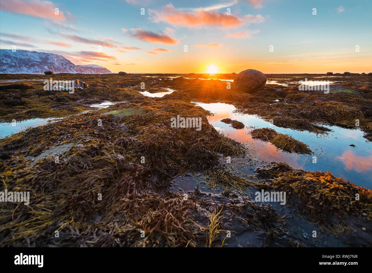 Sun setting over the gulf of St Lawerence, Rocky Harbour, Gros Morne National Park, Newfoundland and Labrador Stock Photo