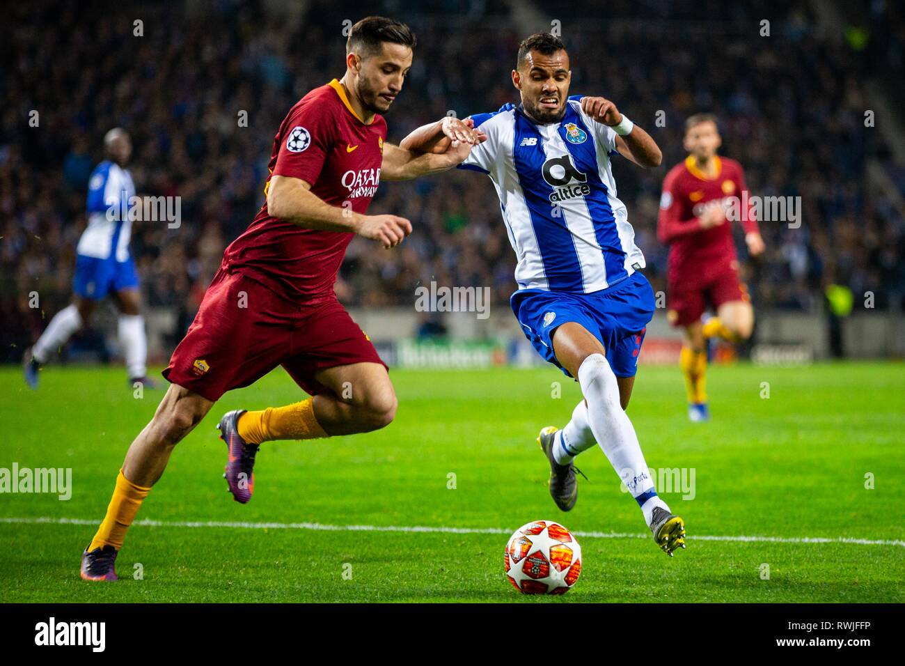 FC Porto's player Fernando Andrade dos Santos (R) vies for the ball with AS Roma's player Patrik Schick (L) during the match against AS Roma for the UEFA Champions League round 16th 2nd leg at Dragon Stadium in Porto. Final Score: FC Porto 3-1 AS Roma Stock Photo