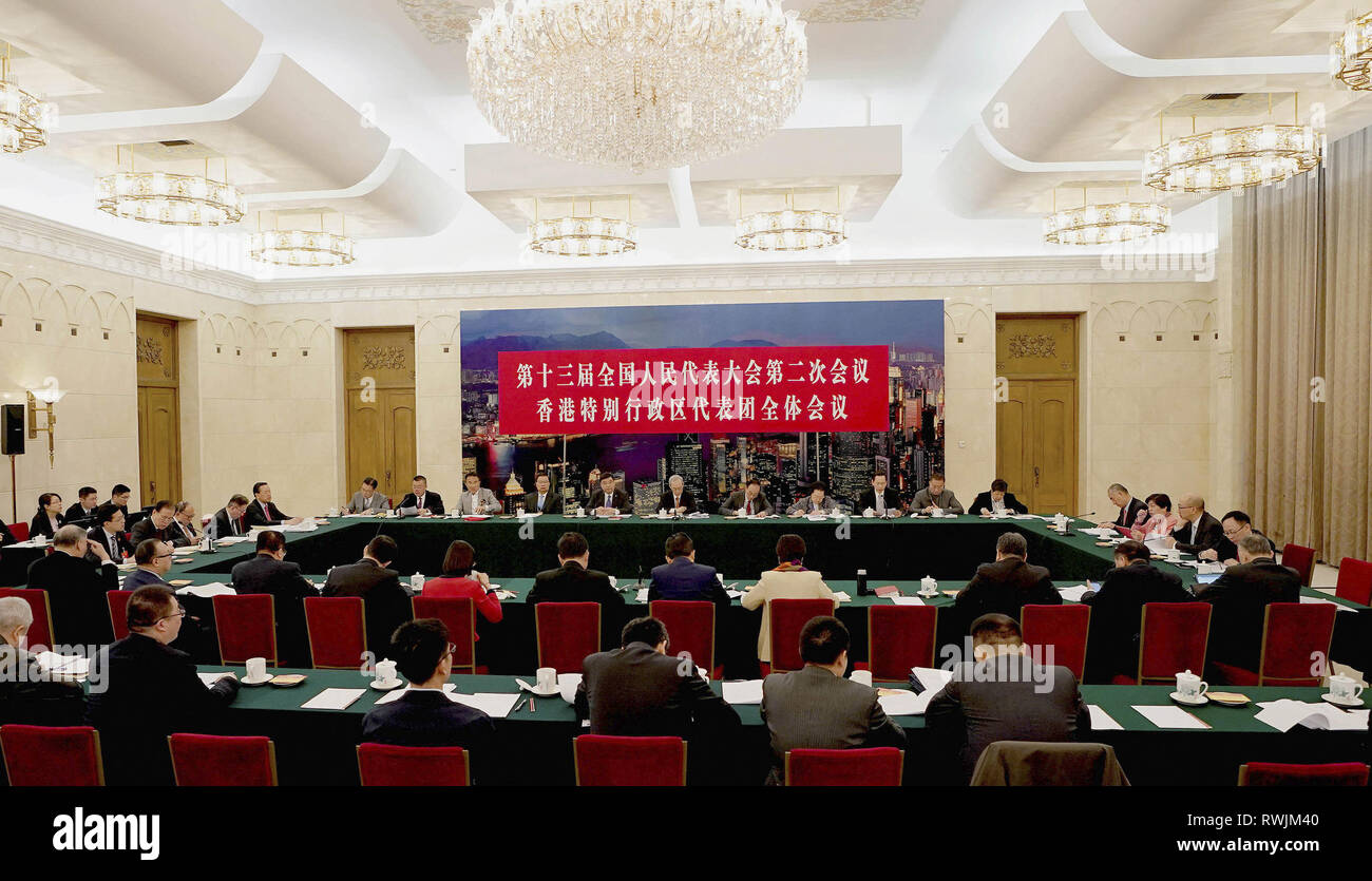 (190307) -- BEIJING, March 7, 2019 (Xinhua) -- Photo taken on March 7, 2019 shows the scene of a plenary meeting of deputies from Hong Kong at the second session of the 13th National People's Congress in Beijing, capital of China. The meeting was opened to media. (Xinhua/Wang Yuguo) Stock Photo