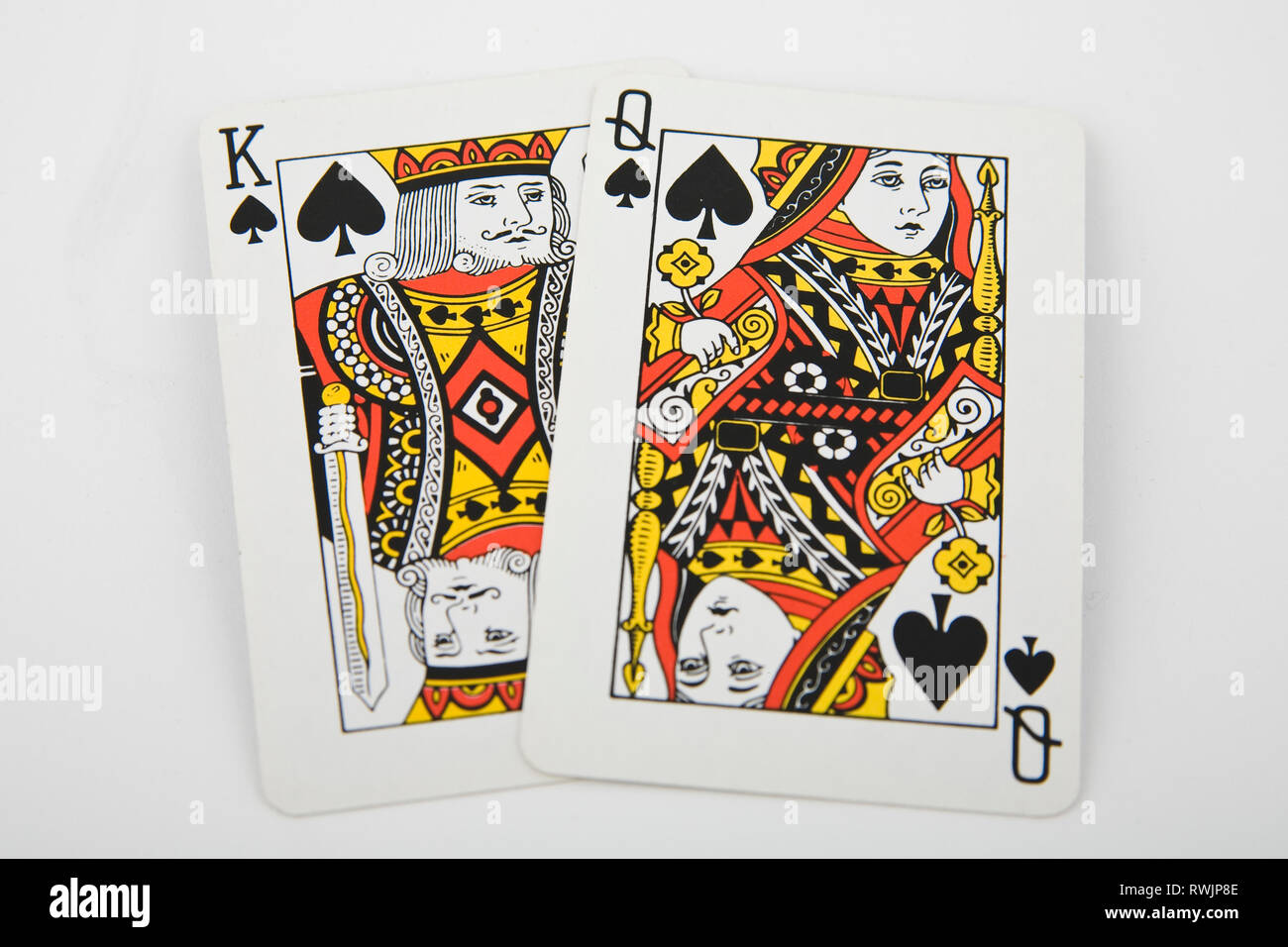 king and queen - playing cards on light background Stock Photo - Alamy