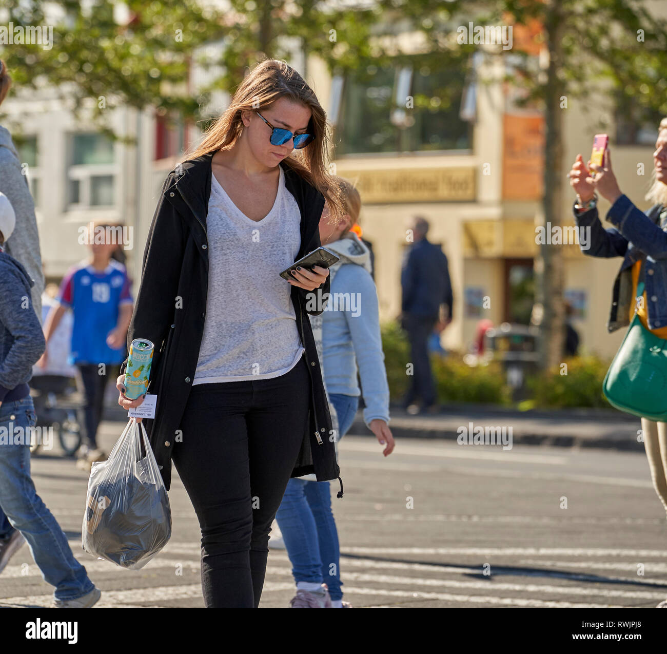 Taking pictures with a smartphone, Reykjavik Festival, Iceland Stock Photo