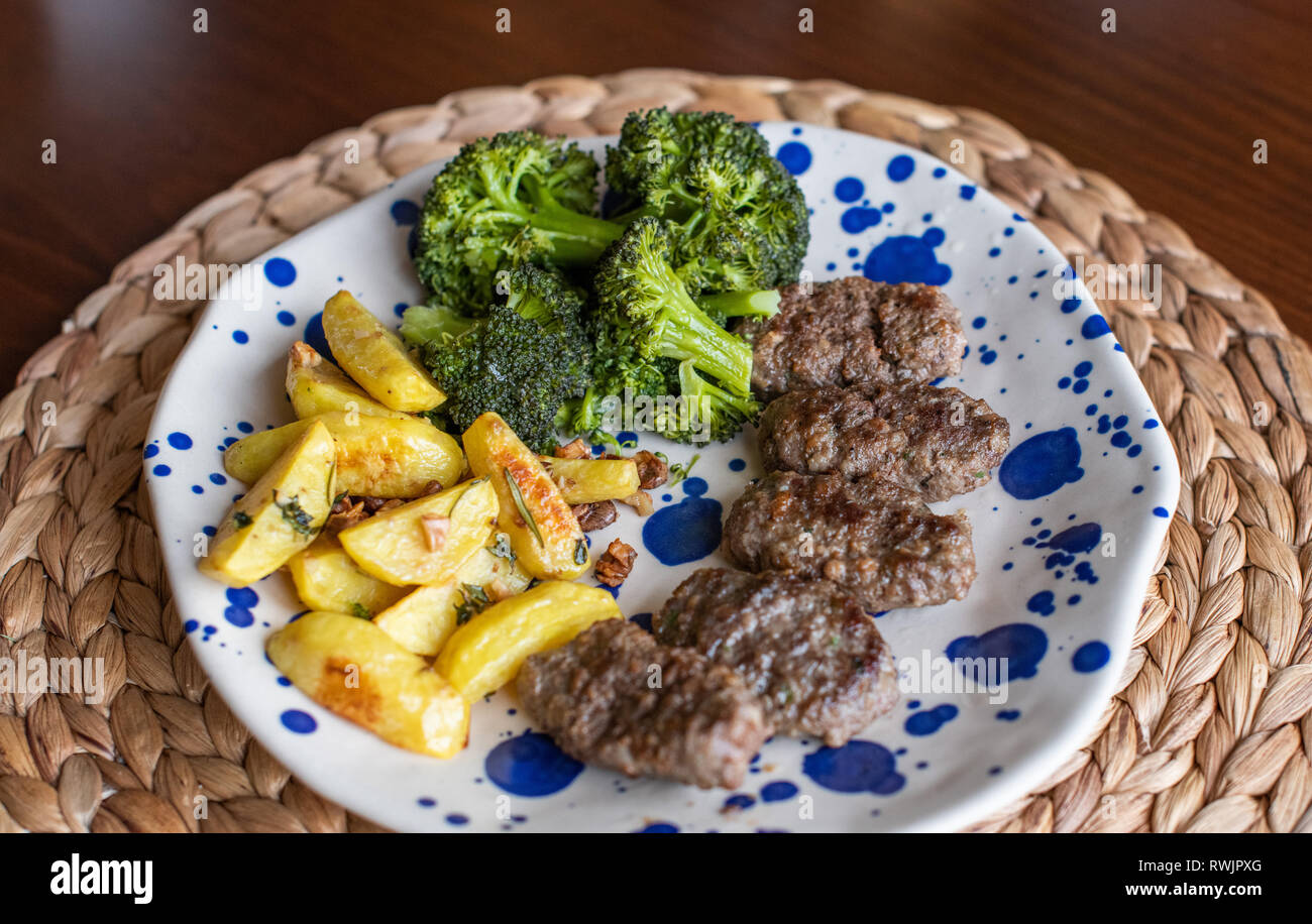 Turkish grilled meatballs AKA Köfte, vegetables on the side Stock Photo ...