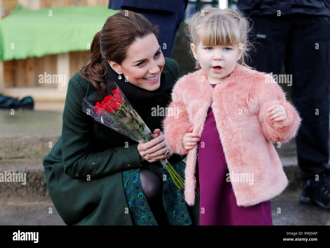 The Duchess of Cambridge receives a flowers during a visit to Revoe ...