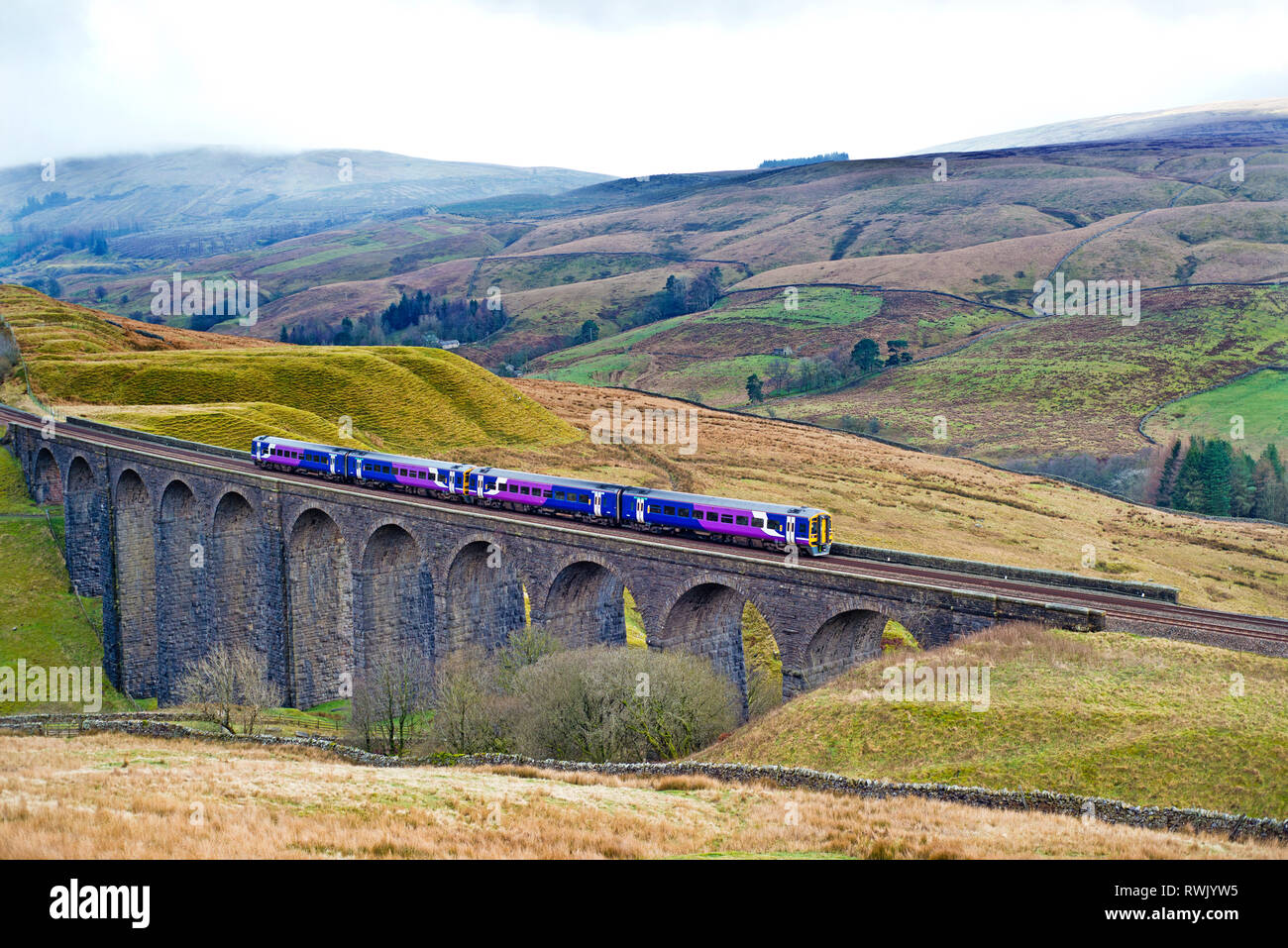 Sprinter train over Arten Gill Viaduct, Settle to Carlisle Railway, Cumbria, England Stock Photo