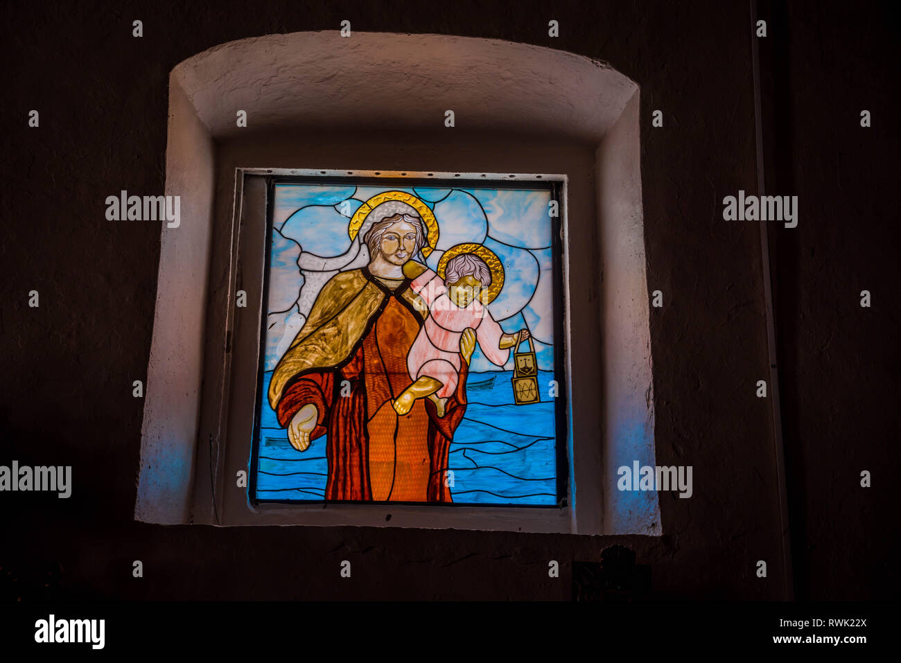 Colorful glass stained window at Church on Taboga Island Panama Stock Photo