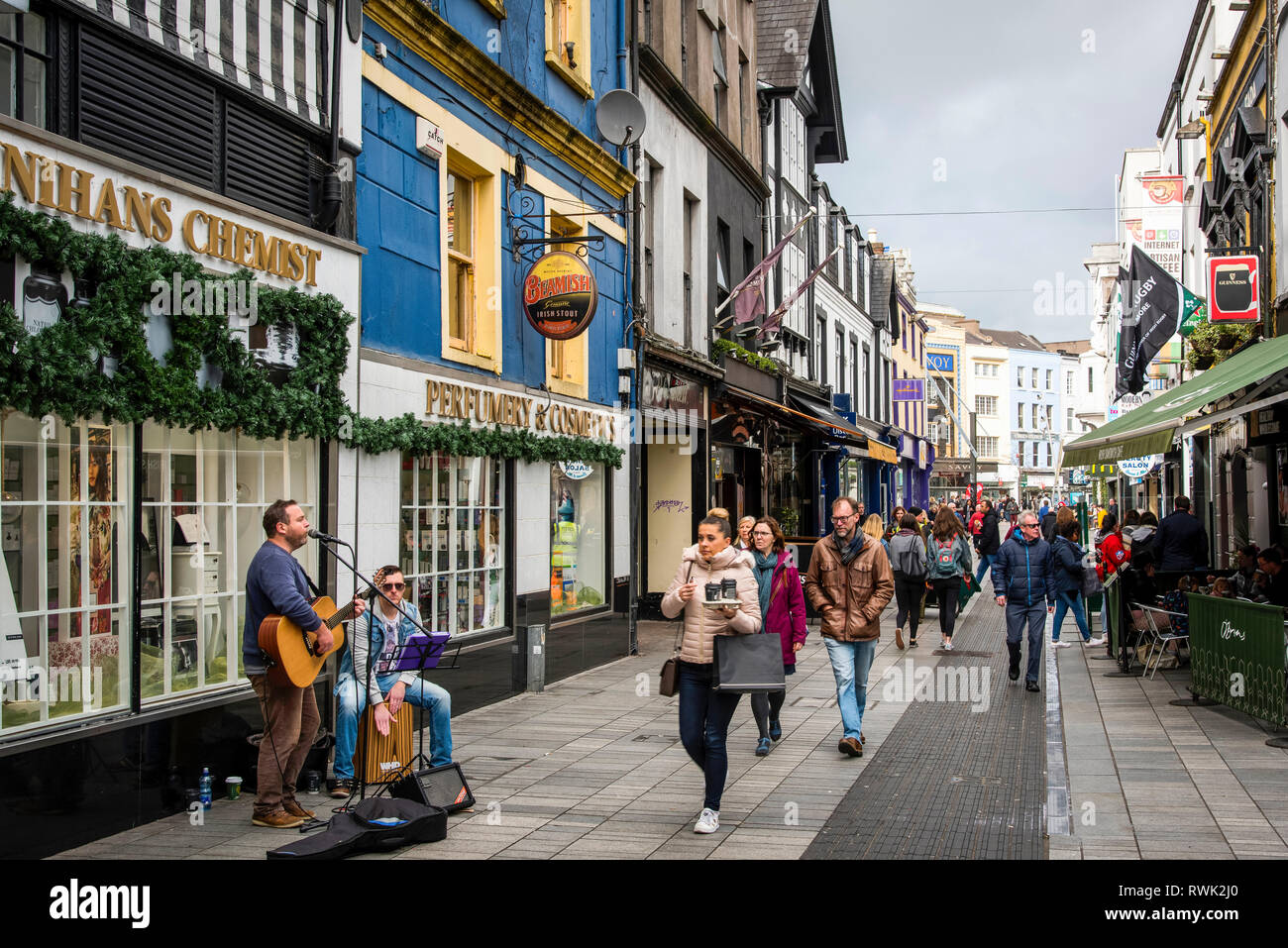 Buskers on a Cork City centre street; Cork City, County. Cork, Ireland Stock Photo