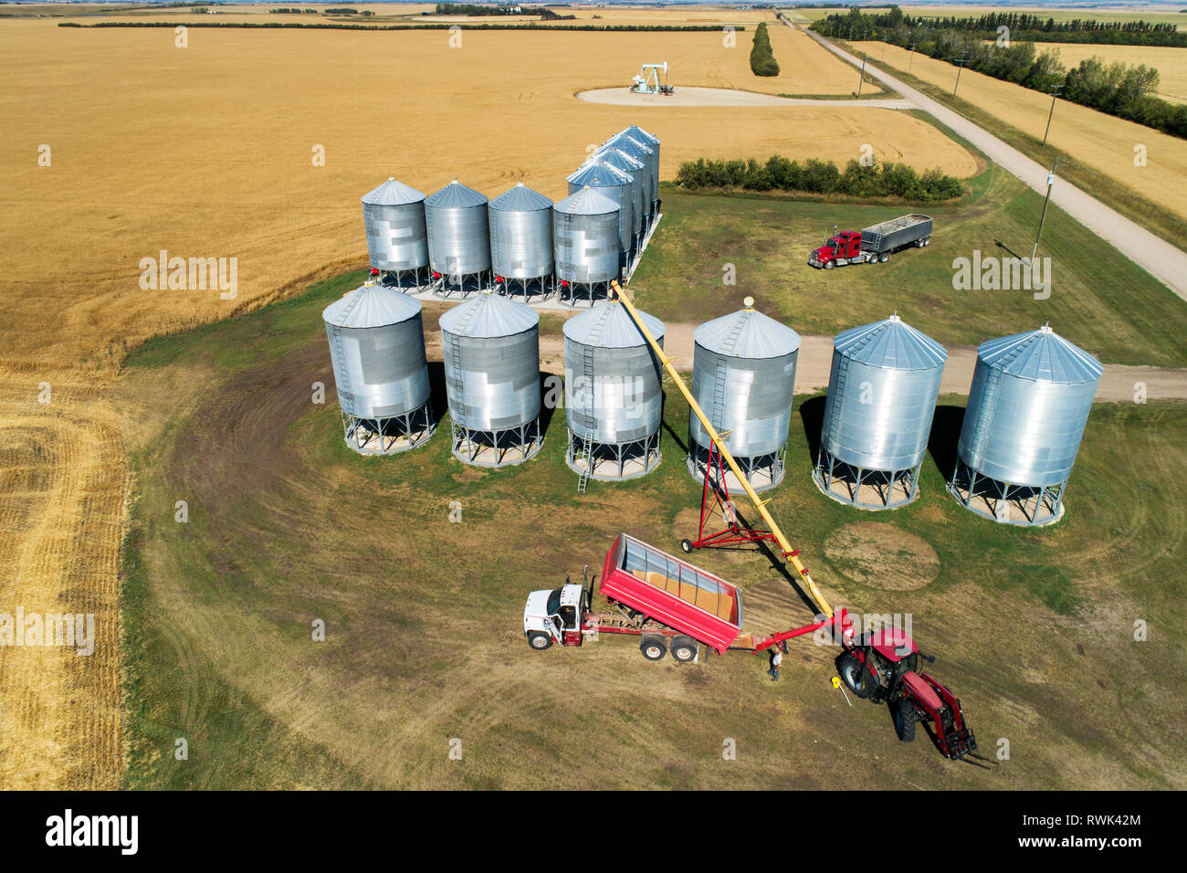 Aerial view looking straight down on a truck full of grain filling