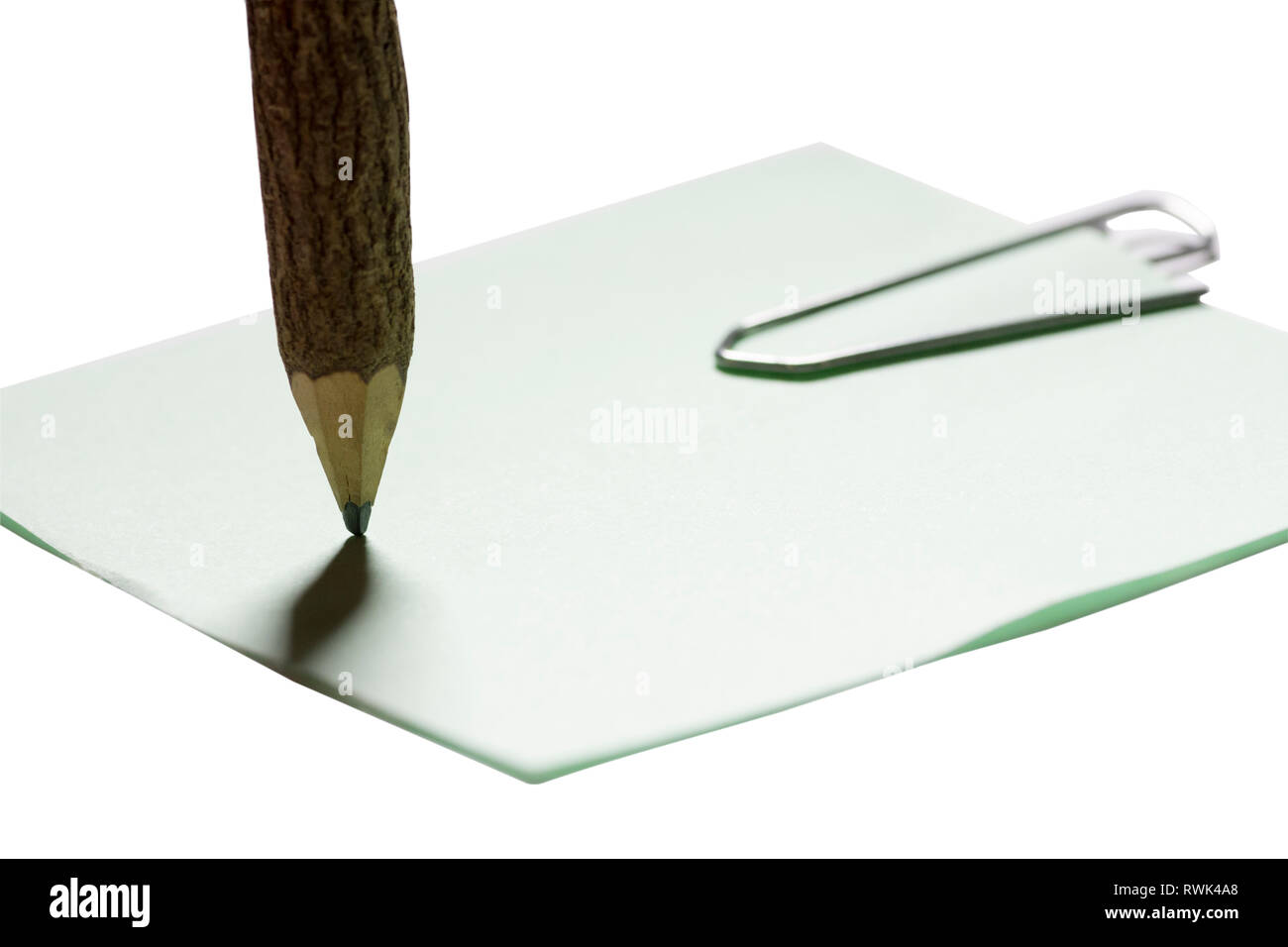 single paper clip with wooden pencil in white background Stock Photo ...
