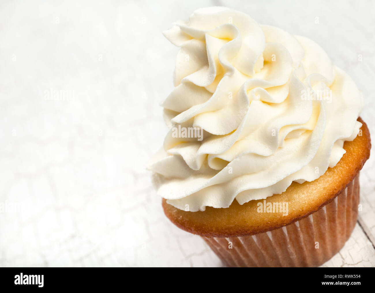 Gourmet vanilla cupcake with buttercream icing Stock Photo Alamy