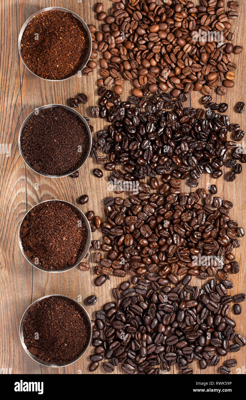 Overhead view of four varieties of fresh roasted coffee Beans Stock