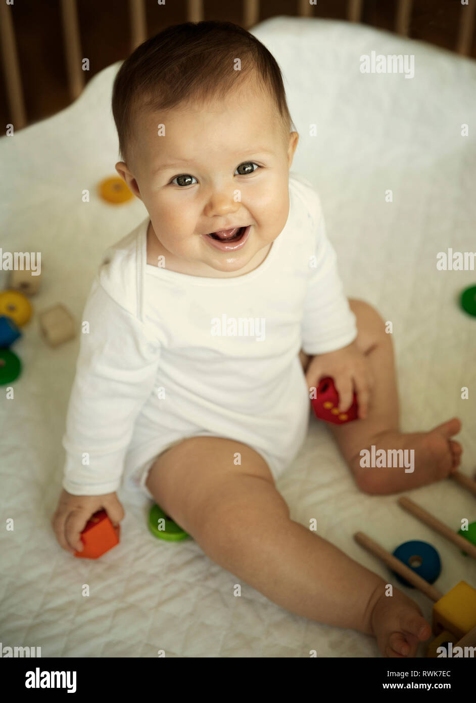 Happy cute child playing with blocks Stock Photo