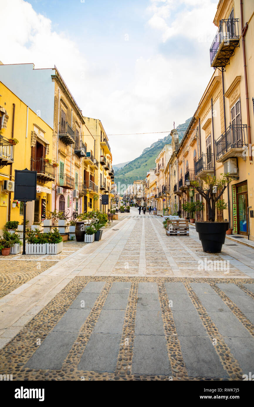 Castellamare del Golfo, Italy - 05.02.2019: Pedestrian street with cafe in Castellammare del Golfo in winter time on the island of Sicily, Italy Stock Photo