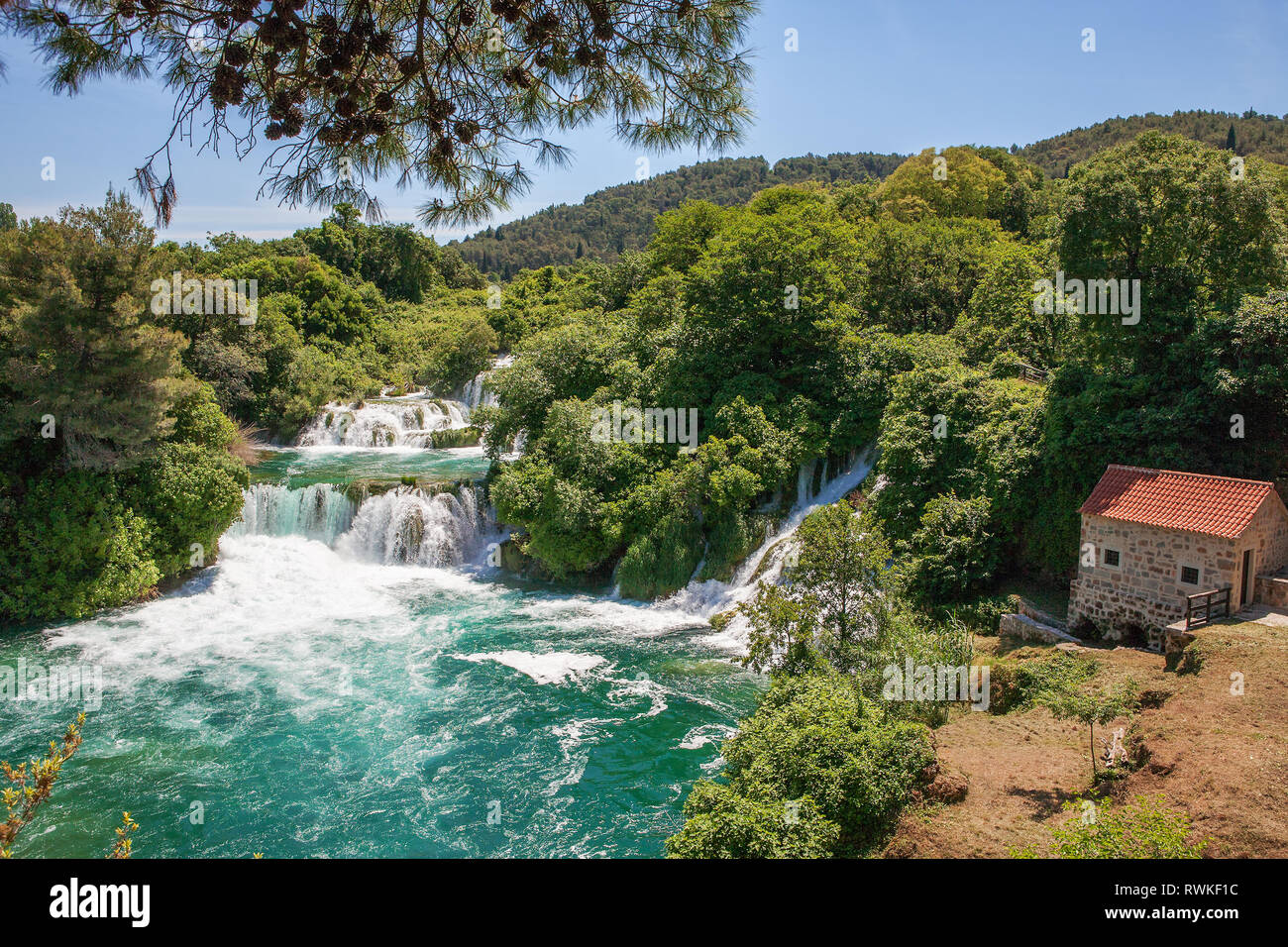 A restored water-mill by the middle sections of Skradinski buk: the last waterfall on the Krka River, Krka National Park, Croatia Stock Photo
