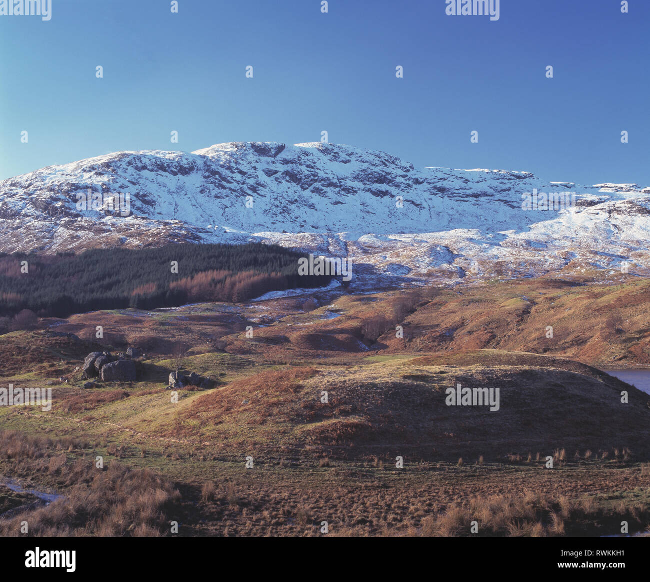 United Kingdom. Scotland. Highlands. Crianlarich Hills. Snow covered mountain. Stock Photo