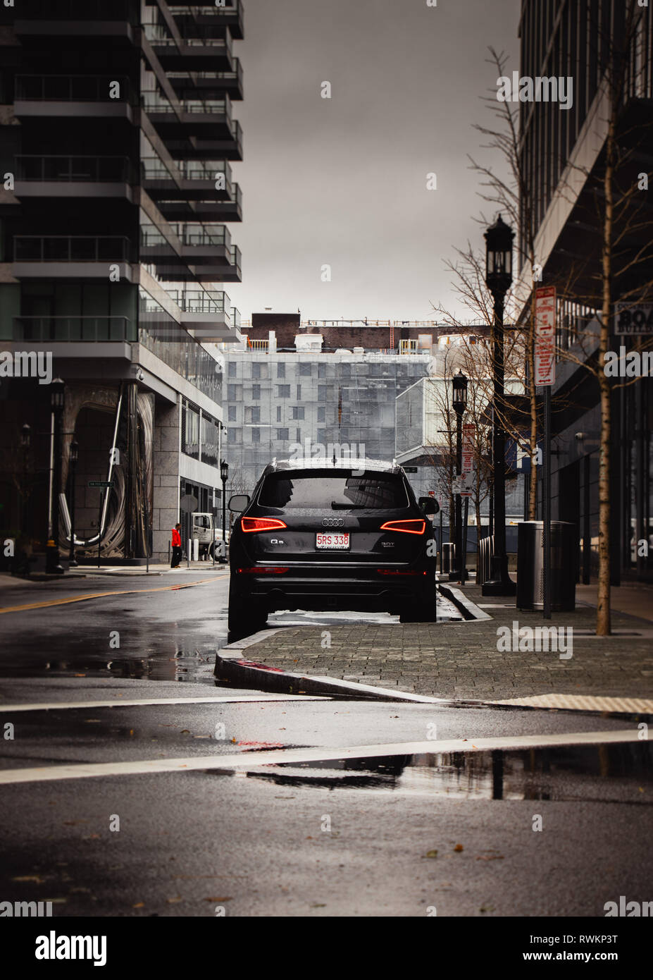 Audi parked in the city on a rainy day Stock Photo