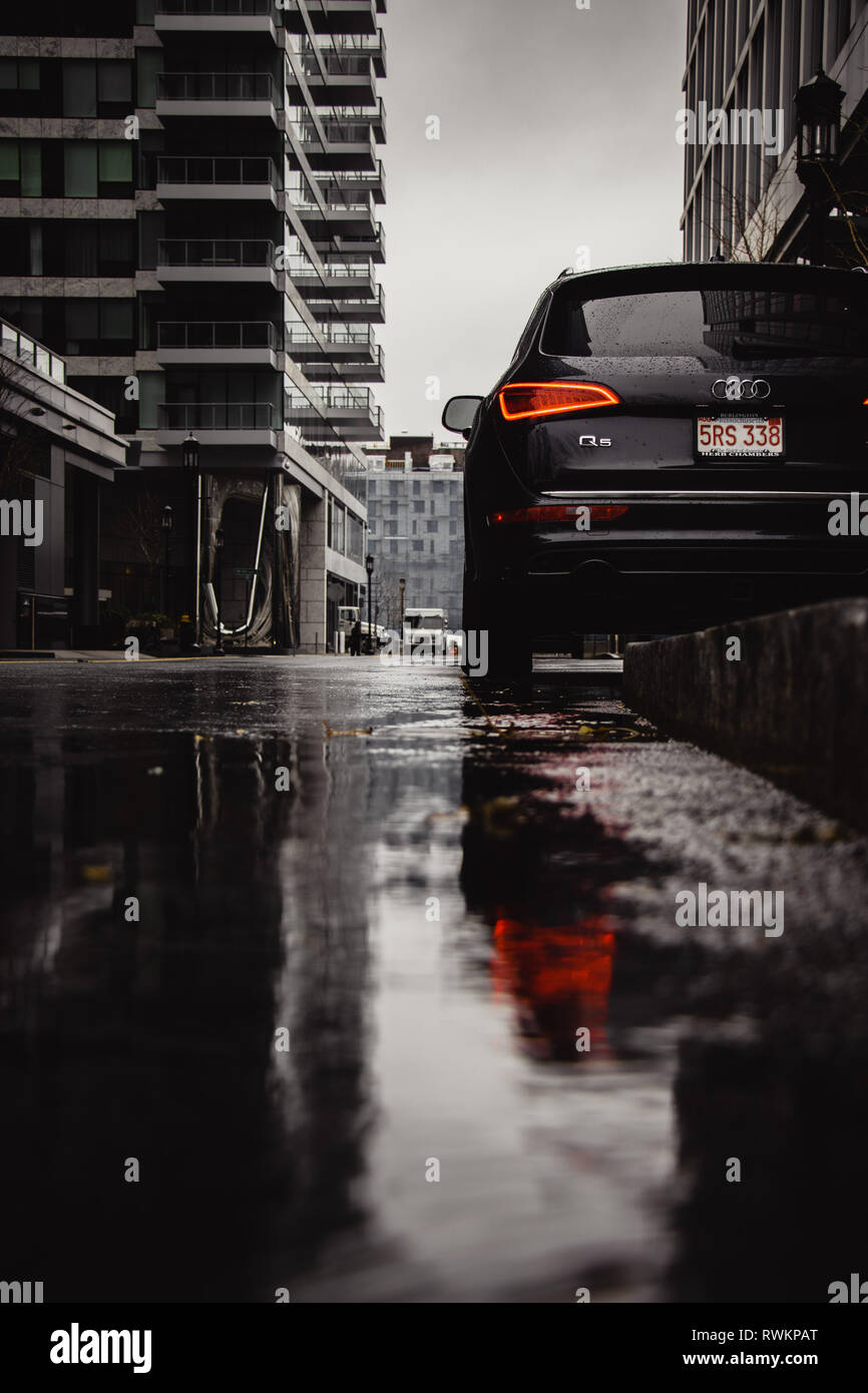 Audi parked in the city on a rainy day Stock Photo