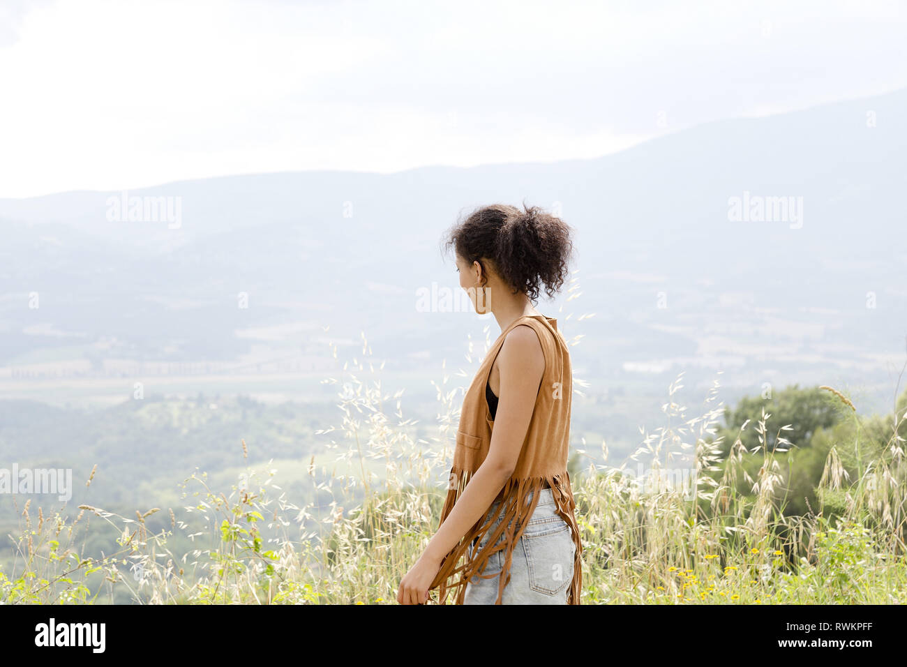 Woman on hilltop, Città della Pieve, Umbria, Italy Stock Photo