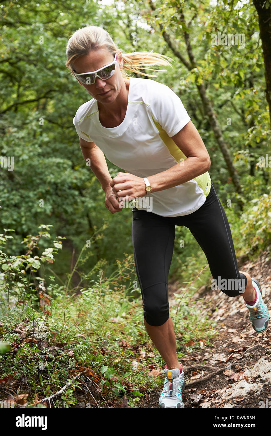 Jogger in forest Stock Photo