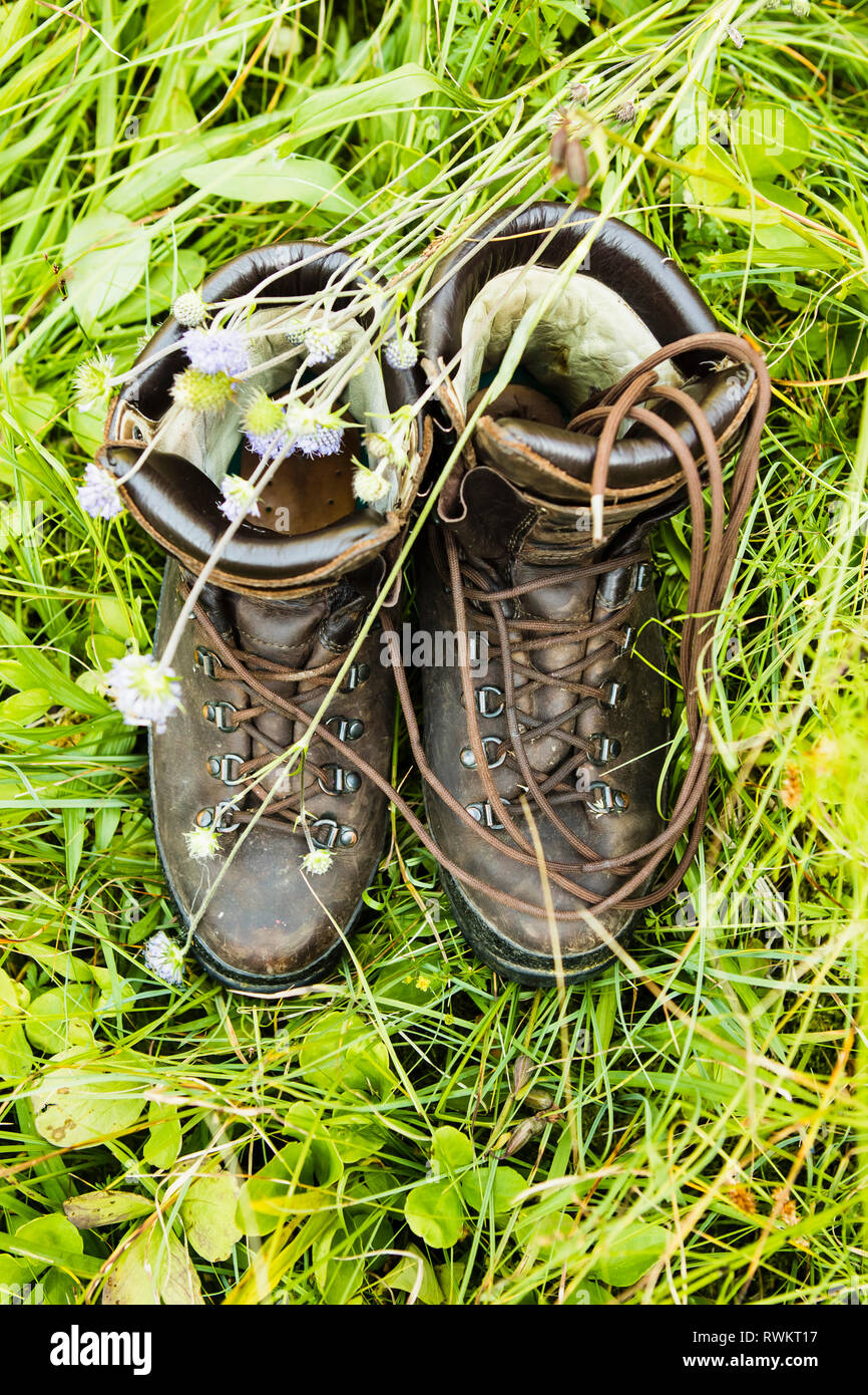 Pair of boots on grass Stock Photo