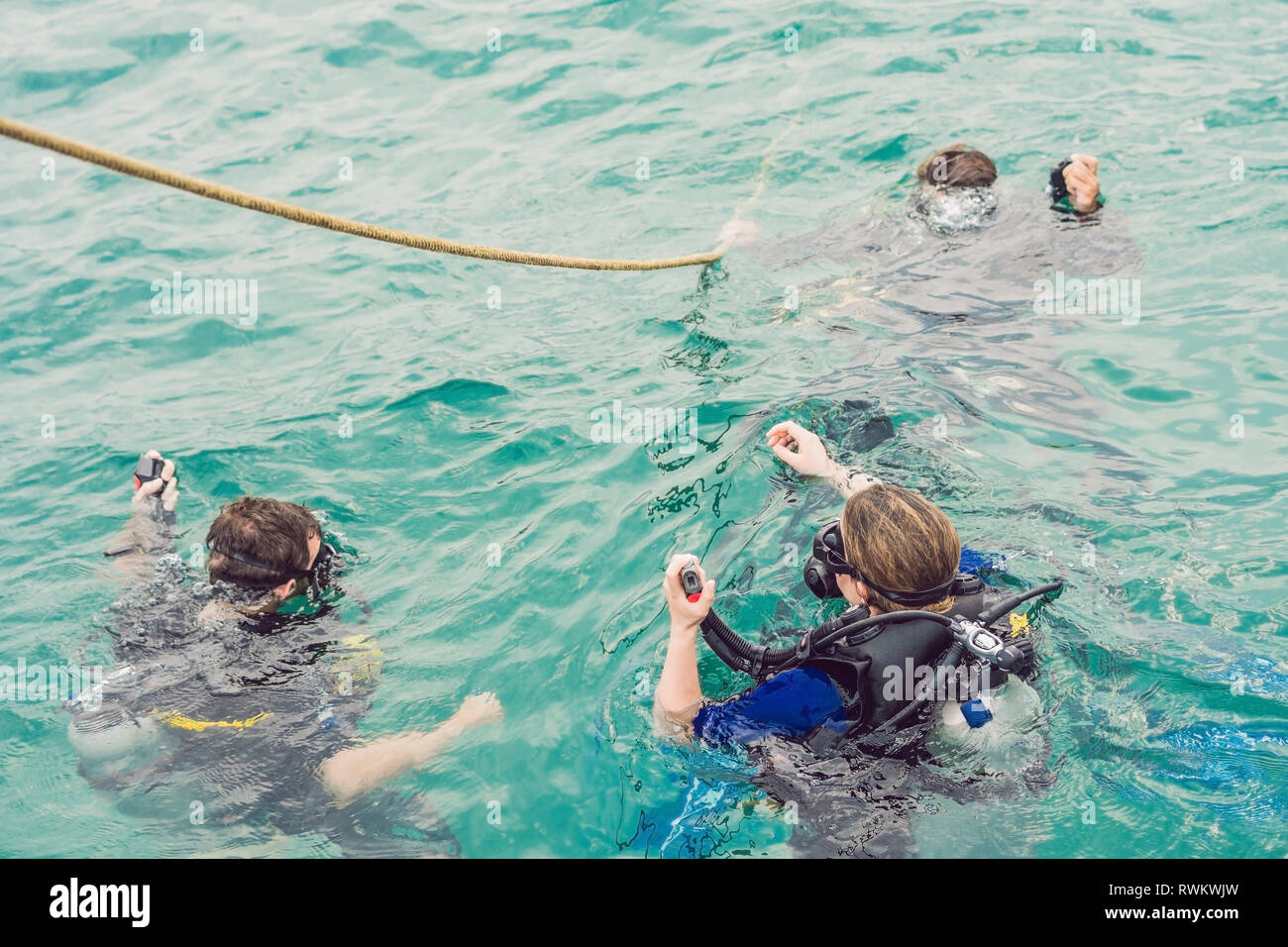 Happy scuba divers training hi-res stock photography and images - Alamy