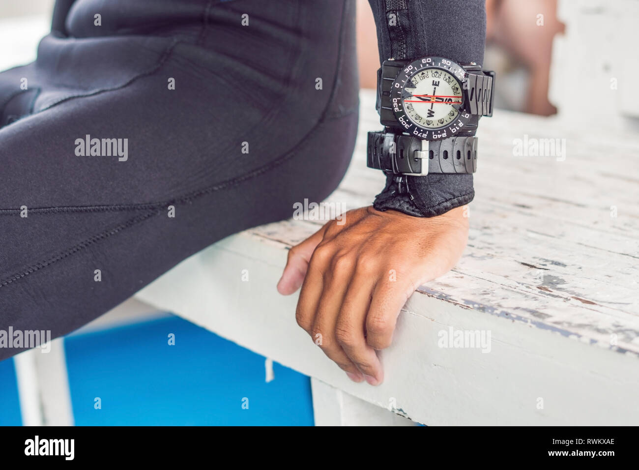Young diver preparing an underwater compass for diving Stock Photo Alamy