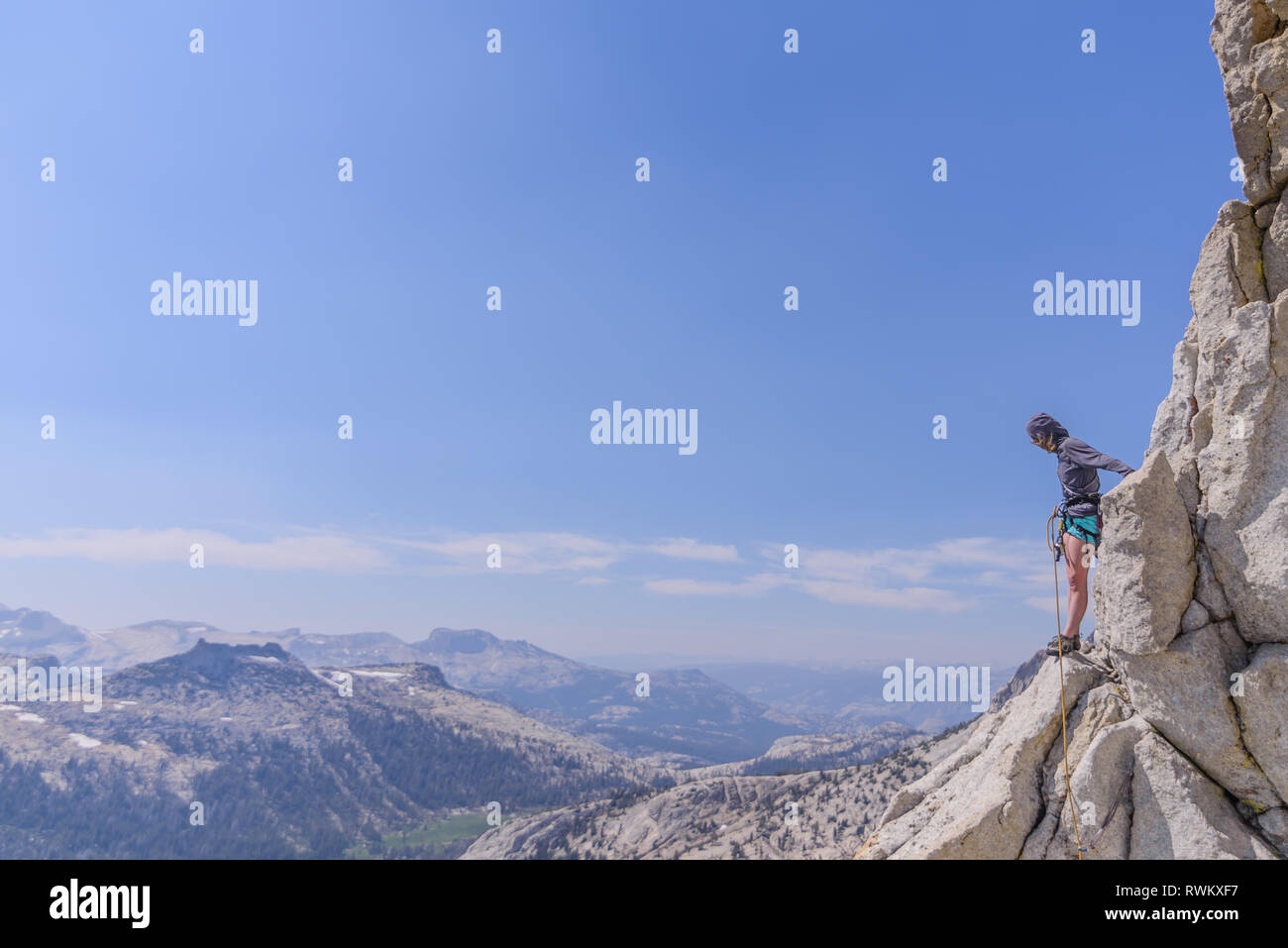 Climber trad climbing, Tuolumne Meadows, Yosemite National Park, California, United States Stock Photo