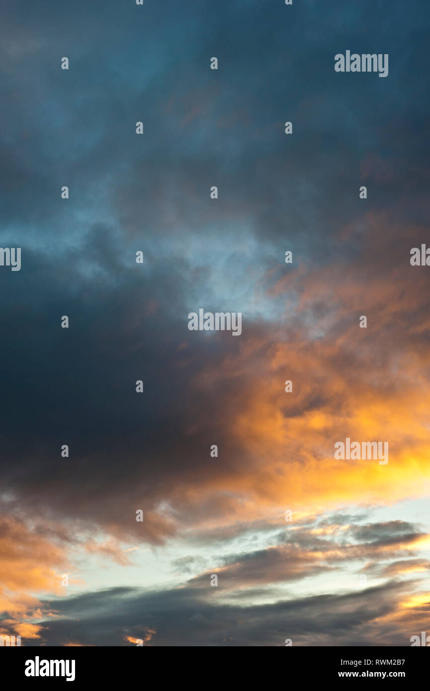 sunset with colorful stratocumulus clouds Stock Photo - Alamy