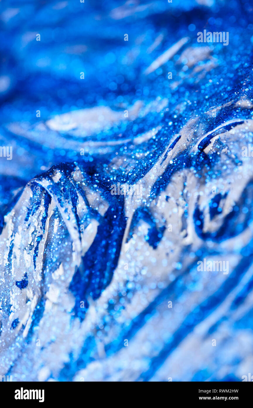 blue abstract background, macro of a silly putty clay Stock Photo