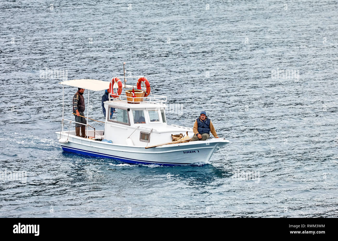 Fisherman in sailing boat hi-res stock photography and images - Alamy
