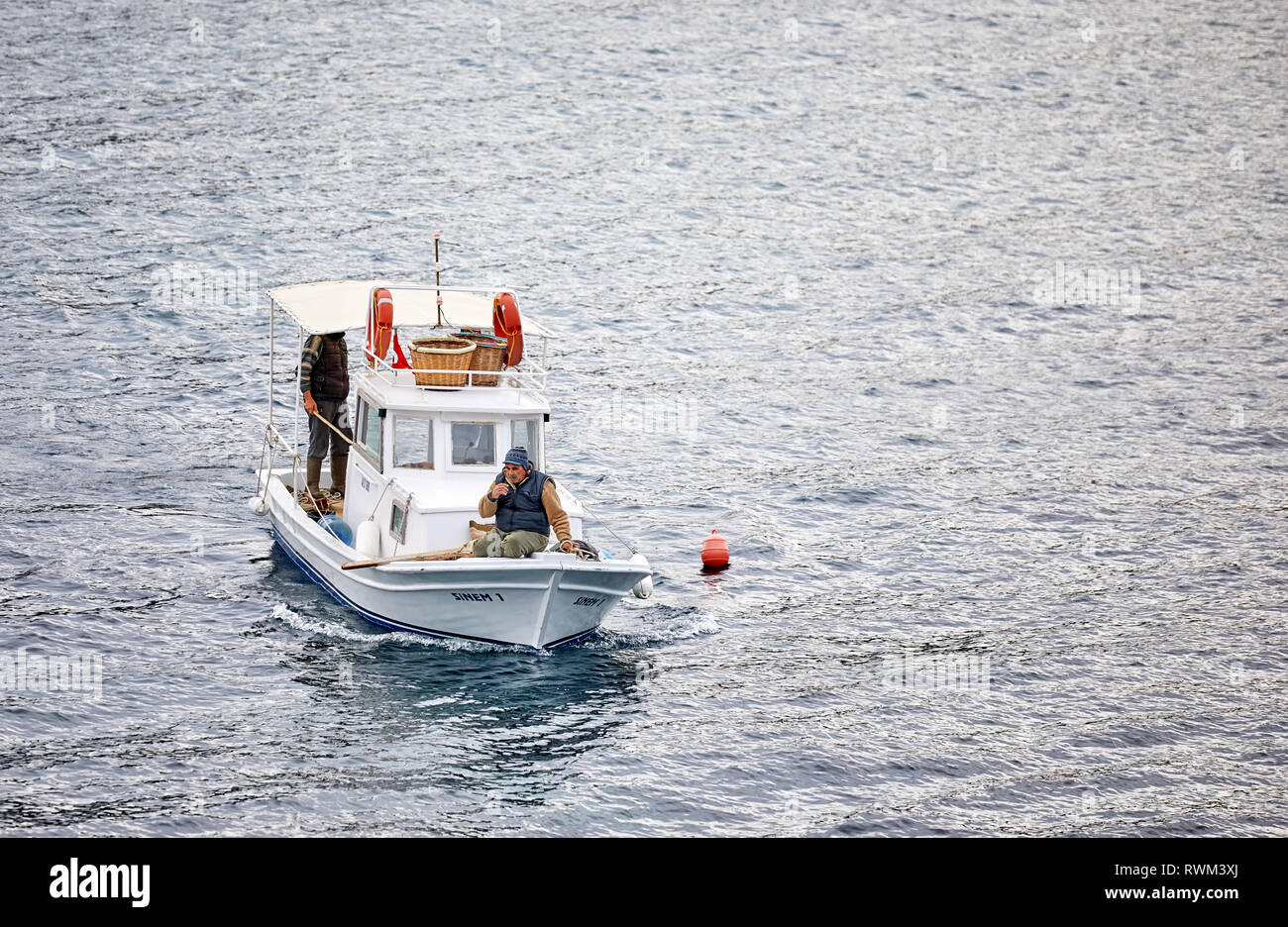 Fisherman in sailing boat hi-res stock photography and images - Alamy