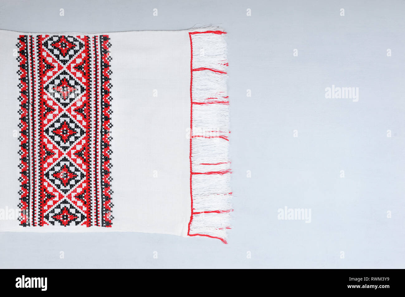Ukrainian towel handmade is made in view of the oldest canons of making towels. Embroidered patterns of towels reflect the foundations of prosperity,  Stock Photo