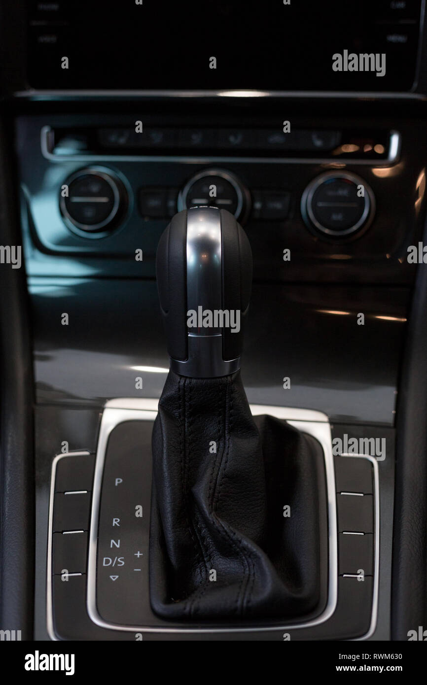 New car with automatic transmission at dealer showroom. Modern and