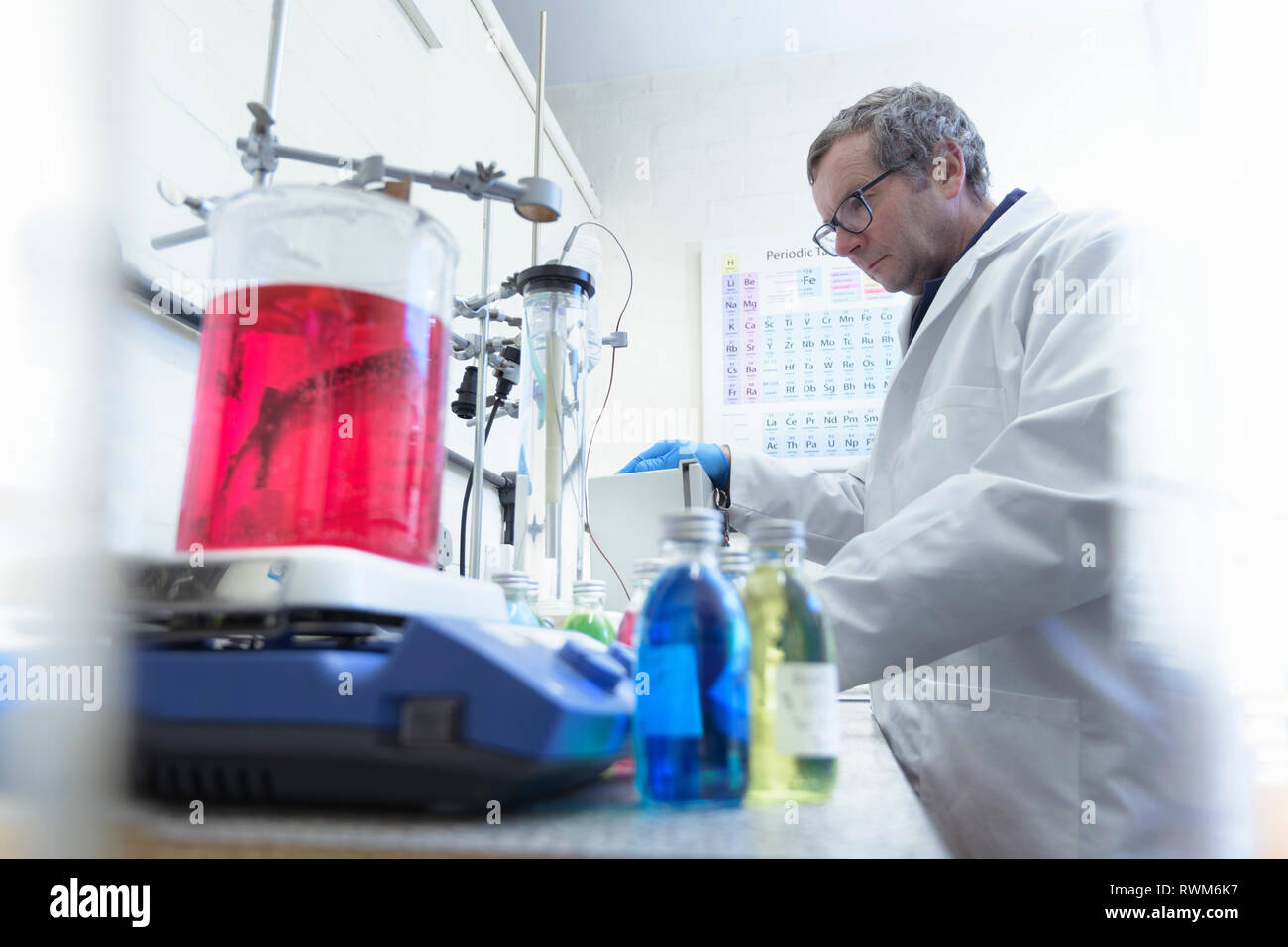 Laboratory worker in chemical factory Stock Photo
