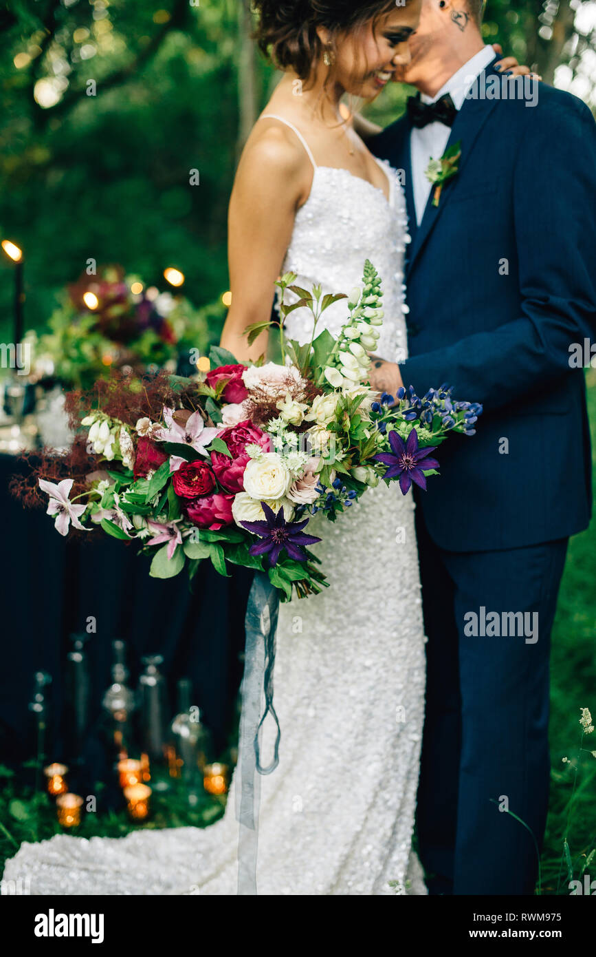 Romantic bride and groom in forest Stock Photo - Alamy