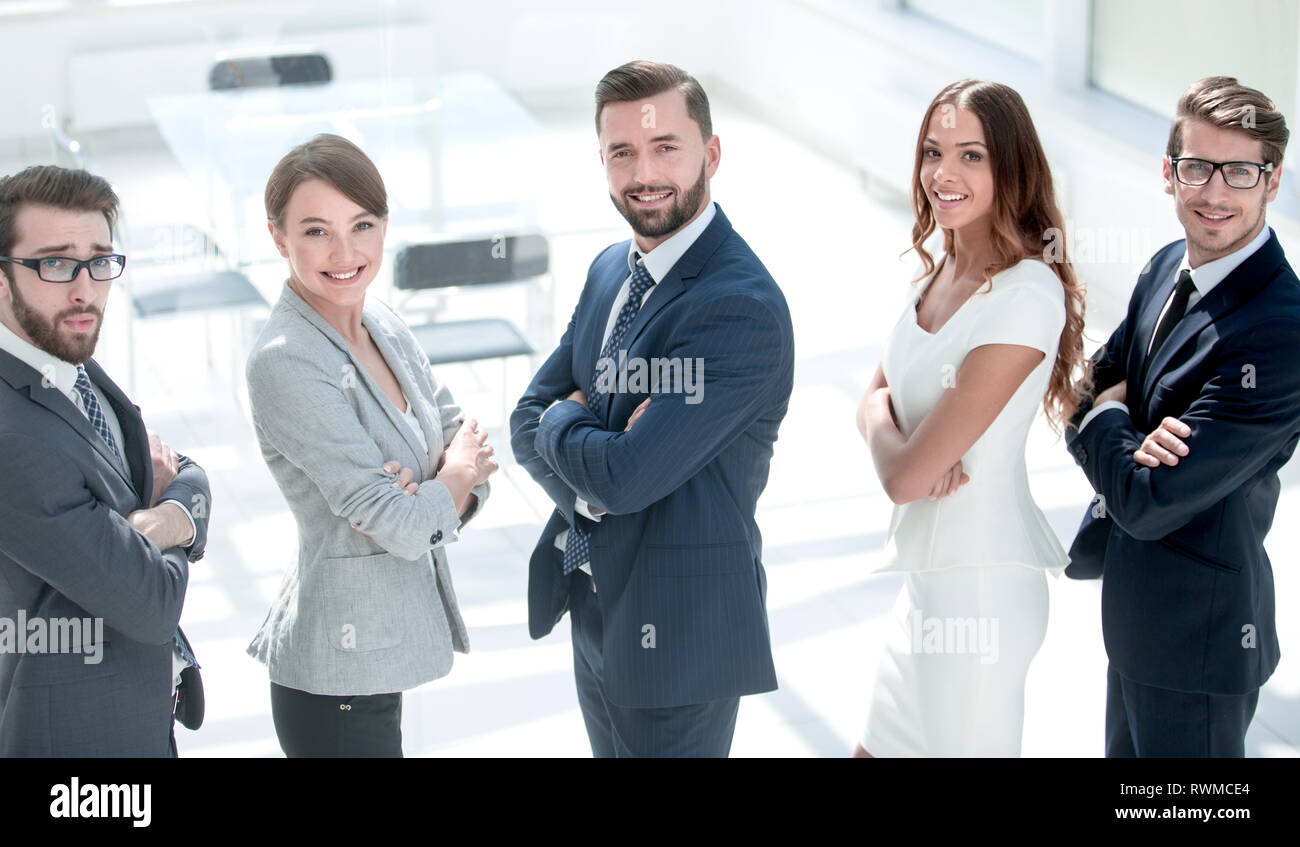side view. successful business people standing together Stock Photo - Alamy
