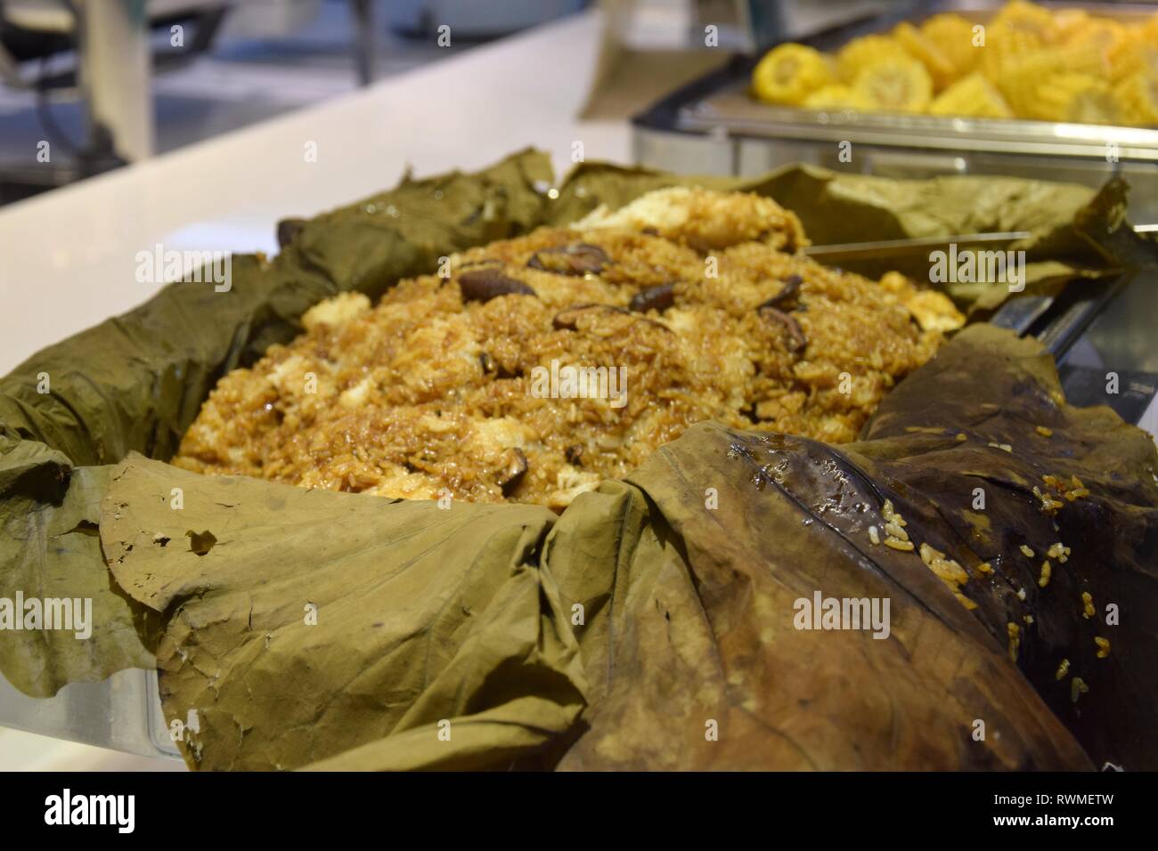Buffet in chinese restaurant. Zongzi, traditional Chinese rice dish