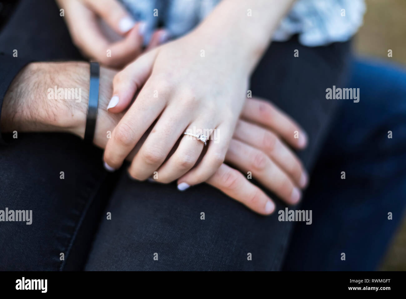 Engagement photo showing the engagement ring on the female's hand; Bothell, Washington, United States of America Stock Photo